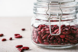 An image depicting red beans in a jar