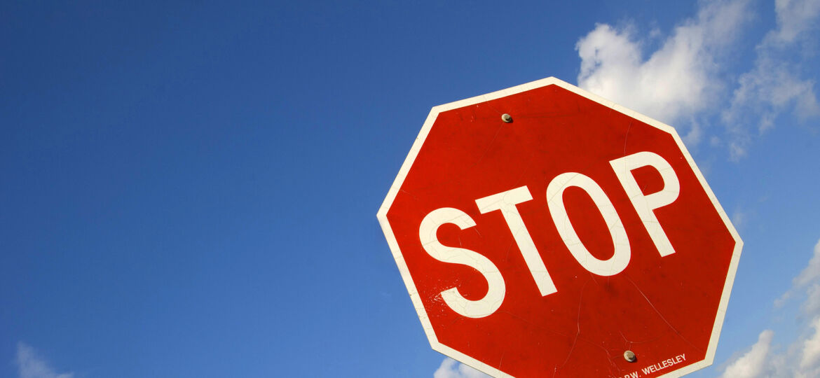 An image depicting a stop sign